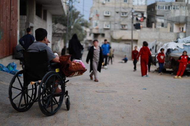 Savaş kalıntılarının ardındaki hayat. Eli ve diz kapağı ampute edildi, uluslararası çağrı yaptı
